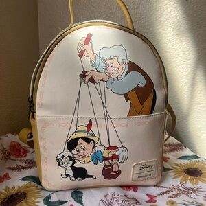 Loungefly Disney Pinocchio Cream and Tan Backpack